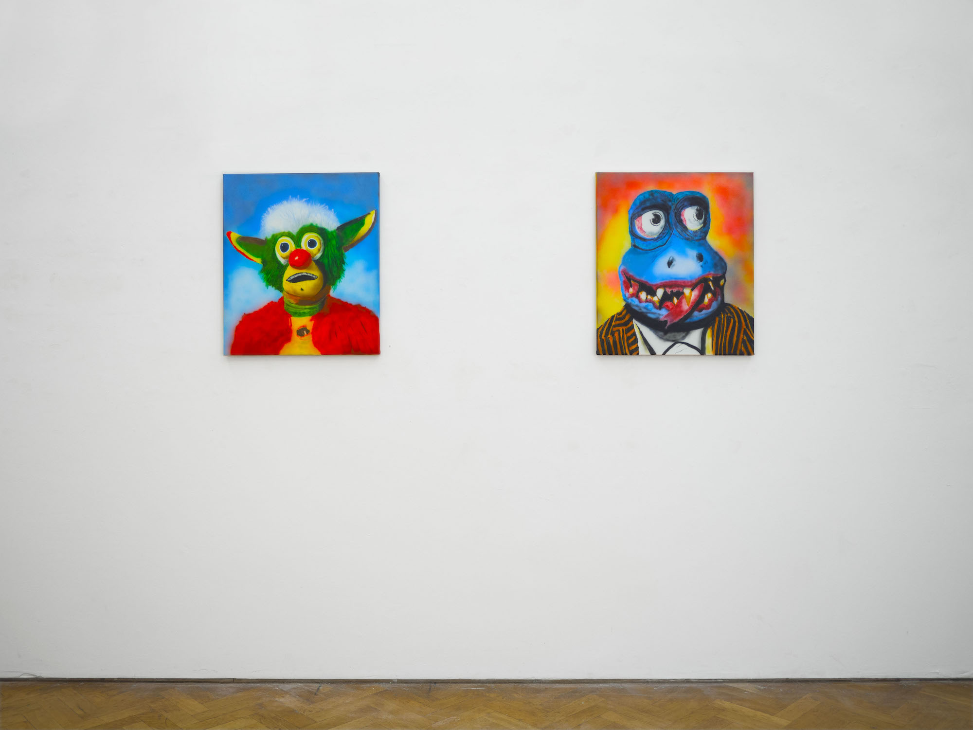 paintings installed in a gallery