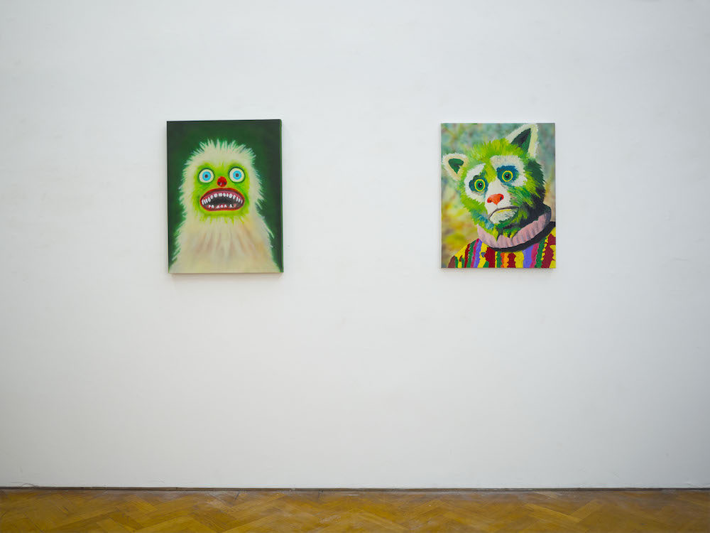 paintings installed in a gallery